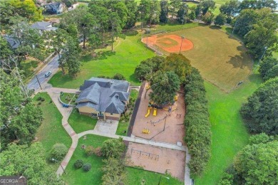 Welcome home to this East Lake Bungalow where vintage vibes meet on Charlie Yates Golf Course in Georgia - for sale on GolfHomes.com, golf home, golf lot