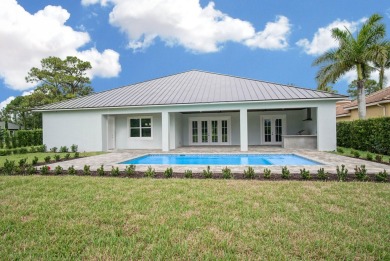 Located on PGA Golf Club's Dye Course, this luxury home has an on The Legacy Golf and Tennis Club in Florida - for sale on GolfHomes.com, golf home, golf lot