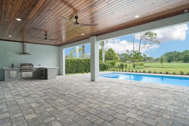 Located on PGA Golf Club's Dye Course, this luxury home has an on The Legacy Golf and Tennis Club in Florida - for sale on GolfHomes.com, golf home, golf lot