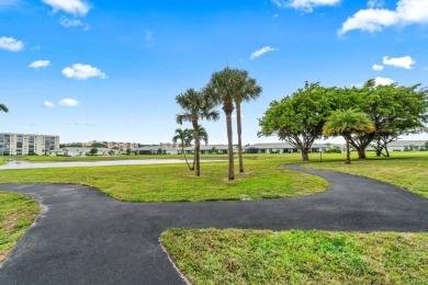COMING SOON!! COMPLETELY remodeled 2-bed, 2-bath 2nd floor END on Marina Lakes Golf Course in Florida - for sale on GolfHomes.com, golf home, golf lot