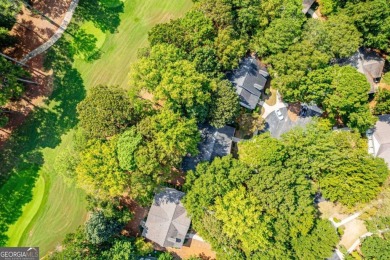 Welcome to this charming cottage nestled in the sought-after on Great Waters Course At Reynolds Plantation in Georgia - for sale on GolfHomes.com, golf home, golf lot