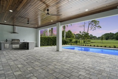 Located on PGA Golf Club's Dye Course, this luxury home has an on The Legacy Golf and Tennis Club in Florida - for sale on GolfHomes.com, golf home, golf lot