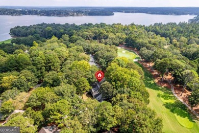 Welcome to this charming cottage nestled in the sought-after on Great Waters Course At Reynolds Plantation in Georgia - for sale on GolfHomes.com, golf home, golf lot