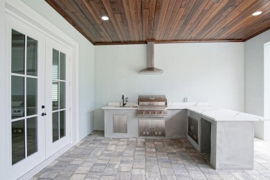Located on PGA Golf Club's Dye Course, this luxury home has an on The Legacy Golf and Tennis Club in Florida - for sale on GolfHomes.com, golf home, golf lot