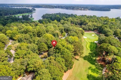 Welcome to this charming cottage nestled in the sought-after on Great Waters Course At Reynolds Plantation in Georgia - for sale on GolfHomes.com, golf home, golf lot