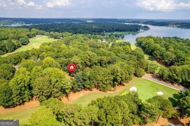 Welcome to this charming cottage nestled in the sought-after on Great Waters Course At Reynolds Plantation in Georgia - for sale on GolfHomes.com, golf home, golf lot