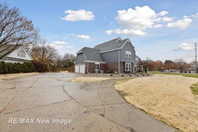 This stunning 5 bedroom home on the golf course at Saginaw on Saginaw Country Club in Michigan - for sale on GolfHomes.com, golf home, golf lot