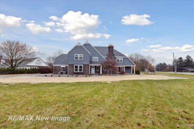 This stunning 5 bedroom home on the golf course at Saginaw on Saginaw Country Club in Michigan - for sale on GolfHomes.com, golf home, golf lot