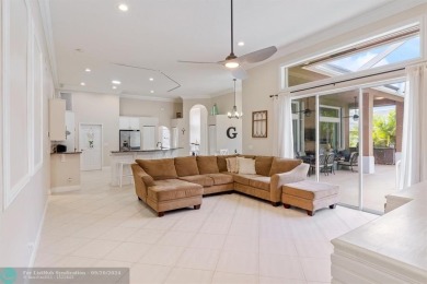 Desirable Grand Cayman model with Screened-in pool with spa on Binks Forest Golf Club in Florida - for sale on GolfHomes.com, golf home, golf lot