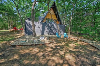 This one of a kind Scandanavian inspired A-frame offers a on Tanglewood Resort in Texas - for sale on GolfHomes.com, golf home, golf lot