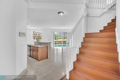 Discover this beautiful 2-story residence at the gated community on Palm-Aire Country Club and Resort - The Oaks in Florida - for sale on GolfHomes.com, golf home, golf lot
