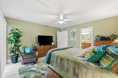 Beautifully updated second-floor condo featuring a tropical on Wynmoor Golf Course in Florida - for sale on GolfHomes.com, golf home, golf lot