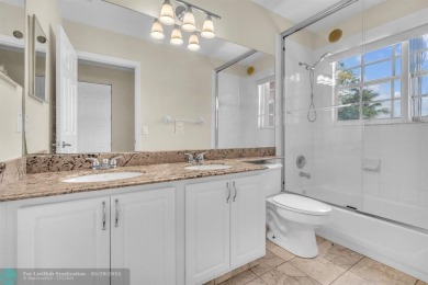 Discover this beautiful 2-story residence at the gated community on Palm-Aire Country Club and Resort - The Oaks in Florida - for sale on GolfHomes.com, golf home, golf lot