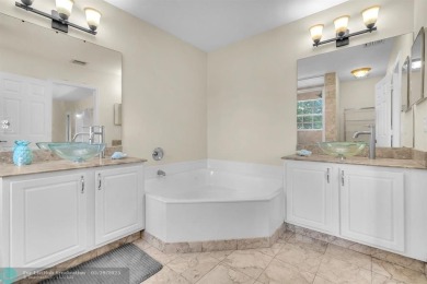 Discover this beautiful 2-story residence at the gated community on Palm-Aire Country Club and Resort - The Oaks in Florida - for sale on GolfHomes.com, golf home, golf lot
