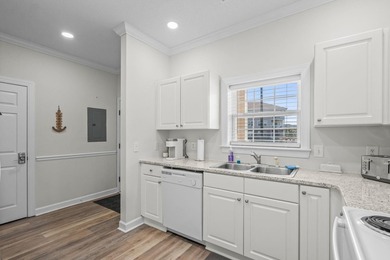 This beautifully upgraded 2-bedroom, 2-bath ground-floor condo on Barefoot Resort and Golf Club  in South Carolina - for sale on GolfHomes.com, golf home, golf lot