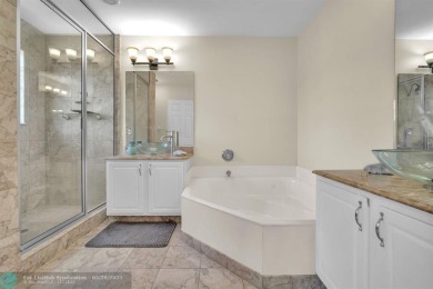 Discover this beautiful 2-story residence at the gated community on Palm-Aire Country Club and Resort - The Oaks in Florida - for sale on GolfHomes.com, golf home, golf lot