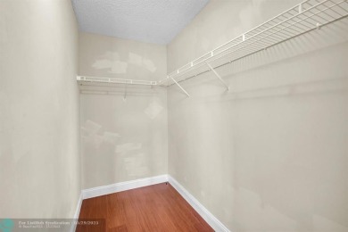 Discover this beautiful 2-story residence at the gated community on Palm-Aire Country Club and Resort - The Oaks in Florida - for sale on GolfHomes.com, golf home, golf lot