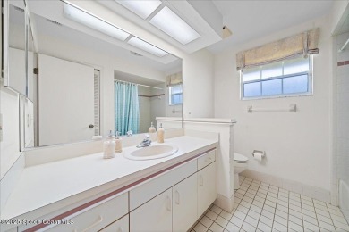 LAKEFRONT LIVING IN THE HEART OF SUNTREE! Nestled on a spacious on Baytree National Golf Links in Florida - for sale on GolfHomes.com, golf home, golf lot