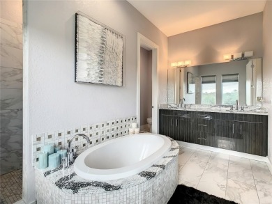 Welcome home to this extraordinary 6 bedroom, 5.5 bathroom on Reunion Resort Golf Course in Florida - for sale on GolfHomes.com, golf home, golf lot