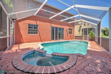 Discover this beautiful 2-story residence at the gated community on Palm-Aire Country Club and Resort - The Oaks in Florida - for sale on GolfHomes.com, golf home, golf lot