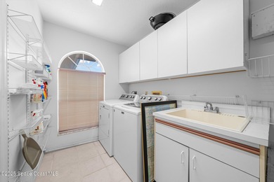 LAKEFRONT LIVING IN THE HEART OF SUNTREE! Nestled on a spacious on Baytree National Golf Links in Florida - for sale on GolfHomes.com, golf home, golf lot