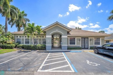 Discover this beautiful 2-story residence at the gated community on Palm-Aire Country Club and Resort - The Oaks in Florida - for sale on GolfHomes.com, golf home, golf lot