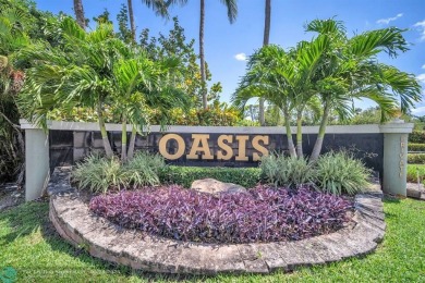 Discover this beautiful 2-story residence at the gated community on Palm-Aire Country Club and Resort - The Oaks in Florida - for sale on GolfHomes.com, golf home, golf lot