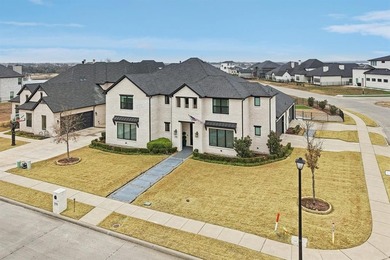 Welcome to this stunning custom Greenbriar home ideally situated on Heath Golf and Yacht Club in Texas - for sale on GolfHomes.com, golf home, golf lot