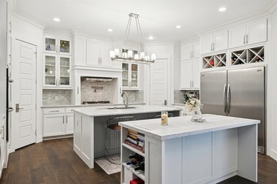 Welcome to this stunning custom Greenbriar home ideally situated on Heath Golf and Yacht Club in Texas - for sale on GolfHomes.com, golf home, golf lot