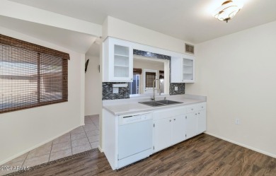 Welcome to this charming 3-bedroom, 2-bath townhouse in the on Sun City Lakes West and East in Arizona - for sale on GolfHomes.com, golf home, golf lot