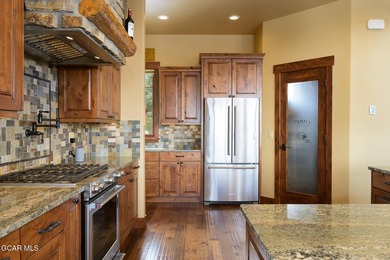 Set on three private acres in Pole Creek Timbers, this on Pole Creek Golf Club in Colorado - for sale on GolfHomes.com, golf home, golf lot