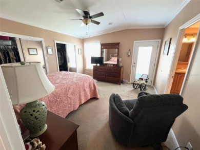 Spacious and Well-Built to Wind Zone III Standards, 2011 Palm on Mangrove Bay Golf Course in Florida - for sale on GolfHomes.com, golf home, golf lot