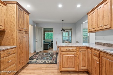 Step into this beautifully maintained 3-bedroom, 2-bathroom home on Lake Tansi Village Country Club in Tennessee - for sale on GolfHomes.com, golf home, golf lot