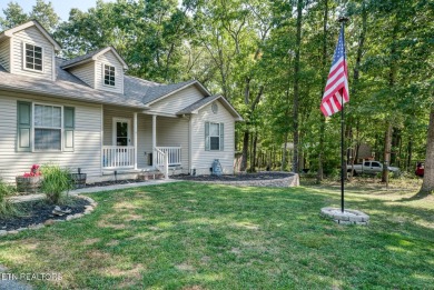 Step into this beautifully maintained 3-bedroom, 2-bathroom home on Lake Tansi Village Country Club in Tennessee - for sale on GolfHomes.com, golf home, golf lot