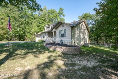 Step into this beautifully maintained 3-bedroom, 2-bathroom home on Lake Tansi Village Country Club in Tennessee - for sale on GolfHomes.com, golf home, golf lot