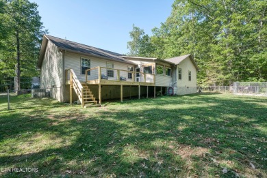 Step into this beautifully maintained 3-bedroom, 2-bathroom home on Lake Tansi Village Country Club in Tennessee - for sale on GolfHomes.com, golf home, golf lot