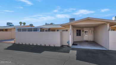 Welcome to this charming 3-bedroom, 2-bath townhouse in the on Sun City Lakes West and East in Arizona - for sale on GolfHomes.com, golf home, golf lot