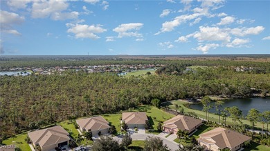 Experience Privacy and Breathtaking Water & Golf Views! This on Herons Glen Golf and Country Club in Florida - for sale on GolfHomes.com, golf home, golf lot