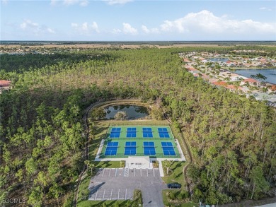 Experience Privacy and Breathtaking Water & Golf Views! This on Herons Glen Golf and Country Club in Florida - for sale on GolfHomes.com, golf home, golf lot
