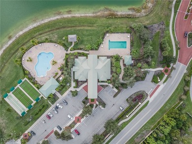 Experience Privacy and Breathtaking Water & Golf Views! This on Herons Glen Golf and Country Club in Florida - for sale on GolfHomes.com, golf home, golf lot