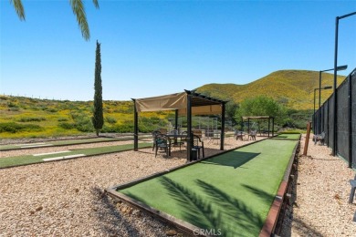 Curb appeal plus on this RARE BARCELONA (2382 sq ft) Plan in the on Menifee Lakes Country Club - Lakes in California - for sale on GolfHomes.com, golf home, golf lot