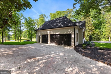 Welcome to this breathtaking four-sided brick estate, perfectly on Whitewater Creek in Georgia - for sale on GolfHomes.com, golf home, golf lot
