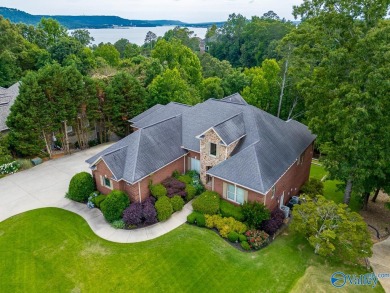 Custom-built executive golf course home featuring lake view & on Gunters Landing in Alabama - for sale on GolfHomes.com, golf home, golf lot