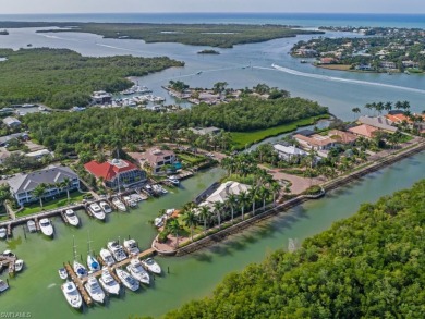 A Rare Find with over 600+ feet of waterfront and quick direct on Windstar on Naples Bay in Florida - for sale on GolfHomes.com, golf home, golf lot