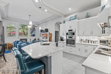 Experience luxury in Baytree, Suntree/Viera's premier gated golf on Baytree National Golf Links in Florida - for sale on GolfHomes.com, golf home, golf lot