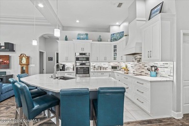 Experience luxury in Baytree, Suntree/Viera's premier gated golf on Baytree National Golf Links in Florida - for sale on GolfHomes.com, golf home, golf lot