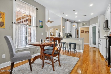 This custom-built brick home offers 2,970 sq.ft. of living space on Magnolia Greens Golf Plantation in North Carolina - for sale on GolfHomes.com, golf home, golf lot