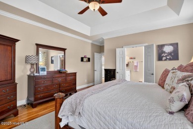 This custom-built brick home offers 2,970 sq.ft. of living space on Magnolia Greens Golf Plantation in North Carolina - for sale on GolfHomes.com, golf home, golf lot