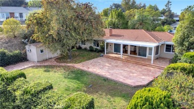 This Mid-century treasure is perched in the picturesque Ganesha on Mountain Meadows Golf Course in California - for sale on GolfHomes.com, golf home, golf lot