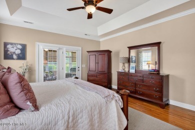 This custom-built brick home offers 2,970 sq.ft. of living space on Magnolia Greens Golf Plantation in North Carolina - for sale on GolfHomes.com, golf home, golf lot